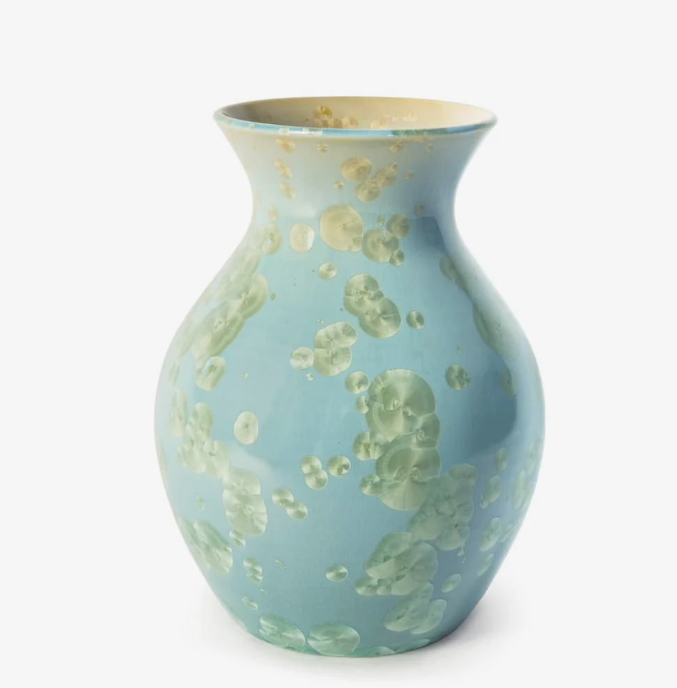 Blue ceramic vase home goods product example.