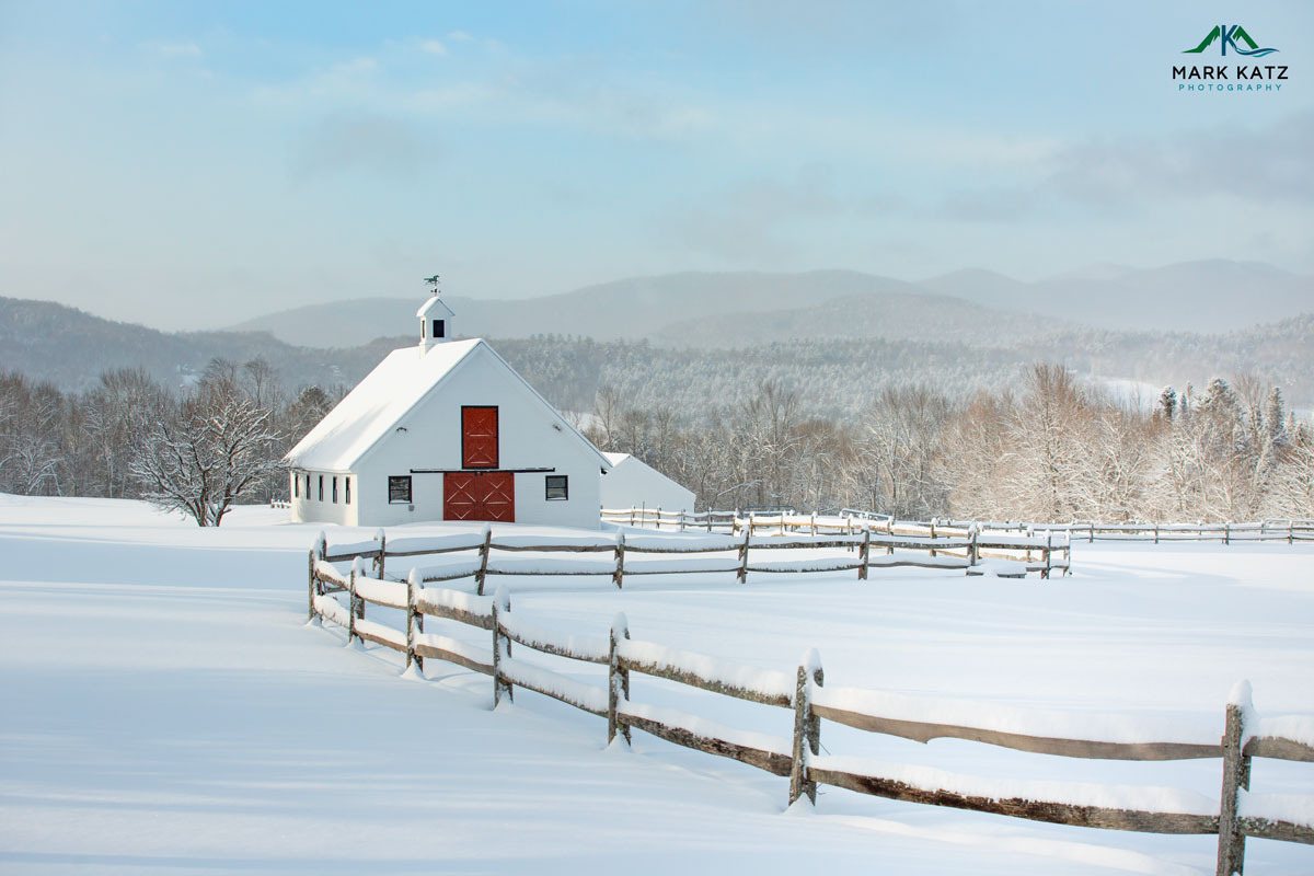 Snow-covered barn photograph used as an example input for NOMEV marketing drafts.